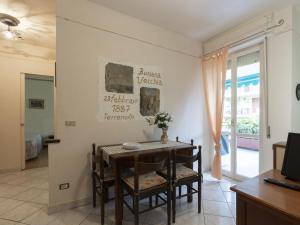 a dining room with a table and chairs at Apartment Fulvia by Interhome in Santo Stefano al Mare