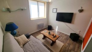 Зона вітальні в Appartement T3 avec extérieur