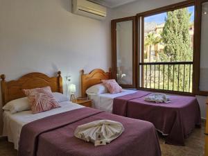 Posteľ alebo postele v izbe v ubytovaní Holiday Home Balcon de Finestrat-1 by Interhome