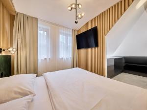 Postel nebo postele na pokoji v ubytování Apartment Máj-7 by Interhome