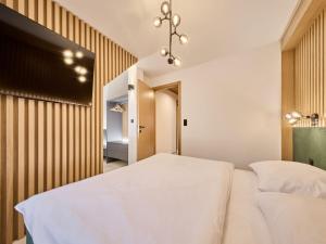 Postel nebo postele na pokoji v ubytování Apartment Máj-7 by Interhome