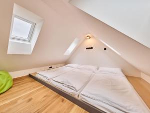 Postel nebo postele na pokoji v ubytování Apartment Máj-7 by Interhome