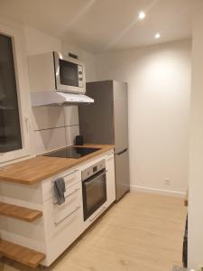 Køkken eller tekøkken på Appartement 3 Chambres