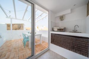 Kuchyňa alebo kuchynka v ubytovaní Apartamento Florida + 10 fotografií