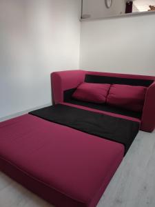 Ένα ή περισσότερα κρεβάτια σε δωμάτιο στο le Cozy Bayeusain