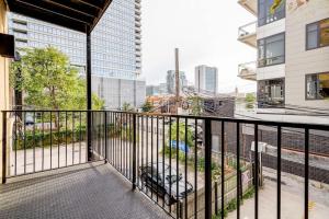 a balcony with a view of a city at 870 bldg - 3 Separate Suites in same building in Chicago