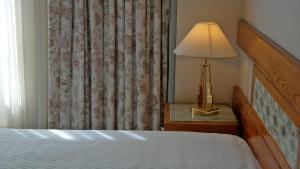 Hotel Das Termas tesisinde bir odada yatak veya yataklar