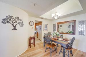 a dining room with a table and chairs at Pool & Hot Tub: Mtn-View Condo in Sugartop Resort! in Sugar Mountain
