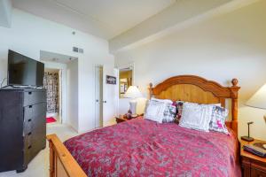 a bedroom with a large bed and a television at Pool & Hot Tub: Mtn-View Condo in Sugartop Resort! in Sugar Mountain +27 photos