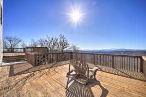 a wooden deck with a bench on top of it at Pool & Hot Tub: Mtn-View Condo in Sugartop Resort! in Sugar Mountain