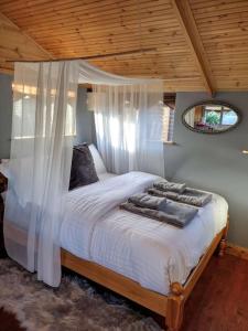 Voodi või voodid majutusasutuse Forest View Cabin toas