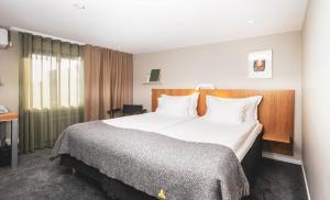 Voodi või voodid majutusasutuse Hotell Borgholm toas