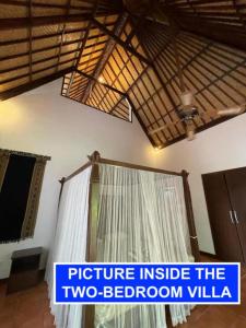 a picture of a room with a two bedroom villa at Villa Lombok Senggigi Kamila Forest By Villaloka in Mangsit