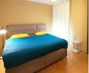 Ein Bett oder Betten in einem Zimmer der Unterkunft Beautiful Apartment, Close to Beach
