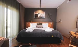 Postel nebo postele na pokoji v ubytování Hotell Borgholm