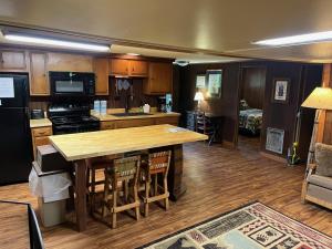 a kitchen with a wooden island in a room at Greenbrier Getaway #538 in Sevierville