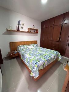 Кровать или кровати в номере Ubicada en el barrio la Julia, excelente ubicación