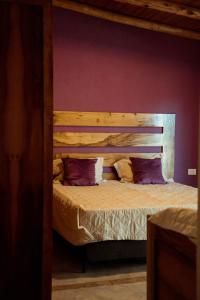 Una cama o camas en una habitación de Posada Bonarda San Rafael