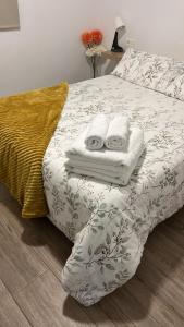 Postel nebo postele na pokoji v ubytování Acogedor Apartamento cerca de la playa