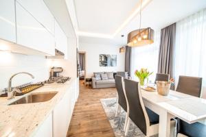 Posedenie v ubytovaní Apartament Szymanowskiego