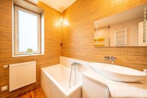 Kúpeľňa v ubytovaní Apartament Szymanowskiego