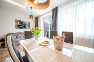 Posedenie v ubytovaní Apartament Szymanowskiego