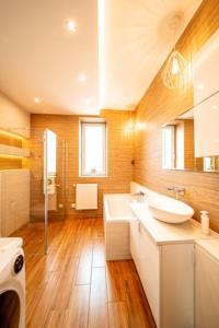 Kúpeľňa v ubytovaní Apartament Szymanowskiego
