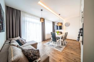 Posedenie v ubytovaní Apartament Szymanowskiego
