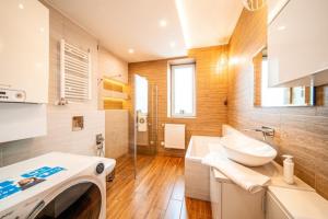 Kúpeľňa v ubytovaní Apartament Szymanowskiego