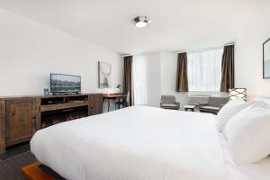 Krevet ili kreveti u jedinici u okviru objekta Adara Hotel