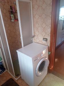 Фотография из галереи Mansarda con terrazzo vista mare в городе Оливери