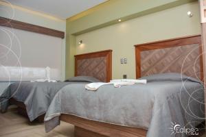 Letto o letti in una camera di HOTEL ECLIPSE TOLUCA