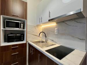 Kuchyňa alebo kuchynka v ubytovaní Sapphire View SKG + 15 fotografií