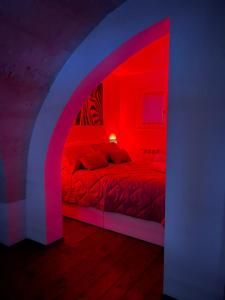 Letto o letti in una camera di Sweet Aura