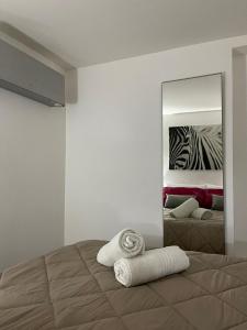 Letto o letti in una camera di Sweet Aura