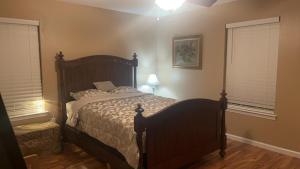 a bedroom with a large bed in a room at Guest House In Cantonment in Jacksonville