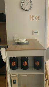 Een keuken of kitchenette bij appartement T2 proche aéroport Orly