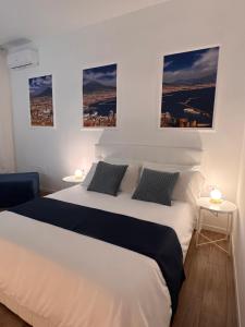 Postel nebo postele na pokoji v ubytování Astorya e’ Napoli