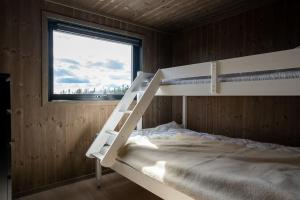 Kerrossänky tai kerrossänkyjä majoituspaikassa New, modern, cosy hut close to Norefjell Ski & Spa