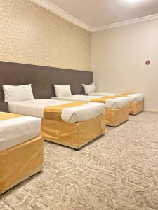 Sraya hotel Mahbas Aljinn房間的床