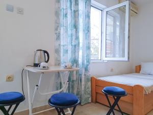 Llit o llits en una habitació de Amisos Apartmani