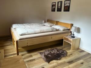 Rúm í herbergi á Ferienwohnung Becker