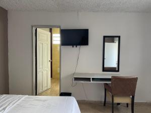 TV a/nebo společenská místnost v ubytování Hotel Cupules