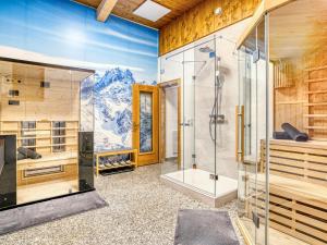 a bathroom with a shower and a glass shower stall at Bergliebe in Kappl +31 photos