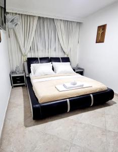 Postel nebo postele na pokoji v ubytování Hermosa casa en Bucaramanga
