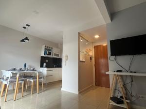 En tv och/eller ett underhållningssystem på Premium Apartment Rosario - Joan Miró