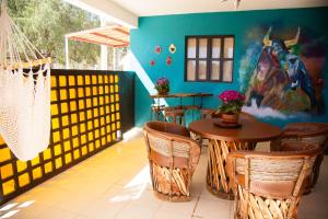 a dining room with a table and chairs at Casa del Horno in El Cinco de Mayo