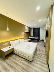 Cama o camas de una habitación en STAR HOTEL
