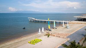 an aerial view of a beach with a pier at Knai Bang Chatt Resort in Kep