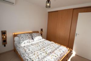 Llit o llits en una habitació de Appartview972